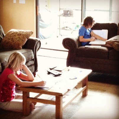 Girls schooling in living room Copyright by Holly Hedman